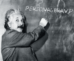 Personal brand strategist concept — professor writing "personal brand" on a chalkboard